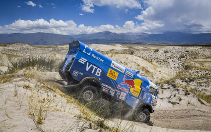 KAMAZ racing truck in rough desert terrain 